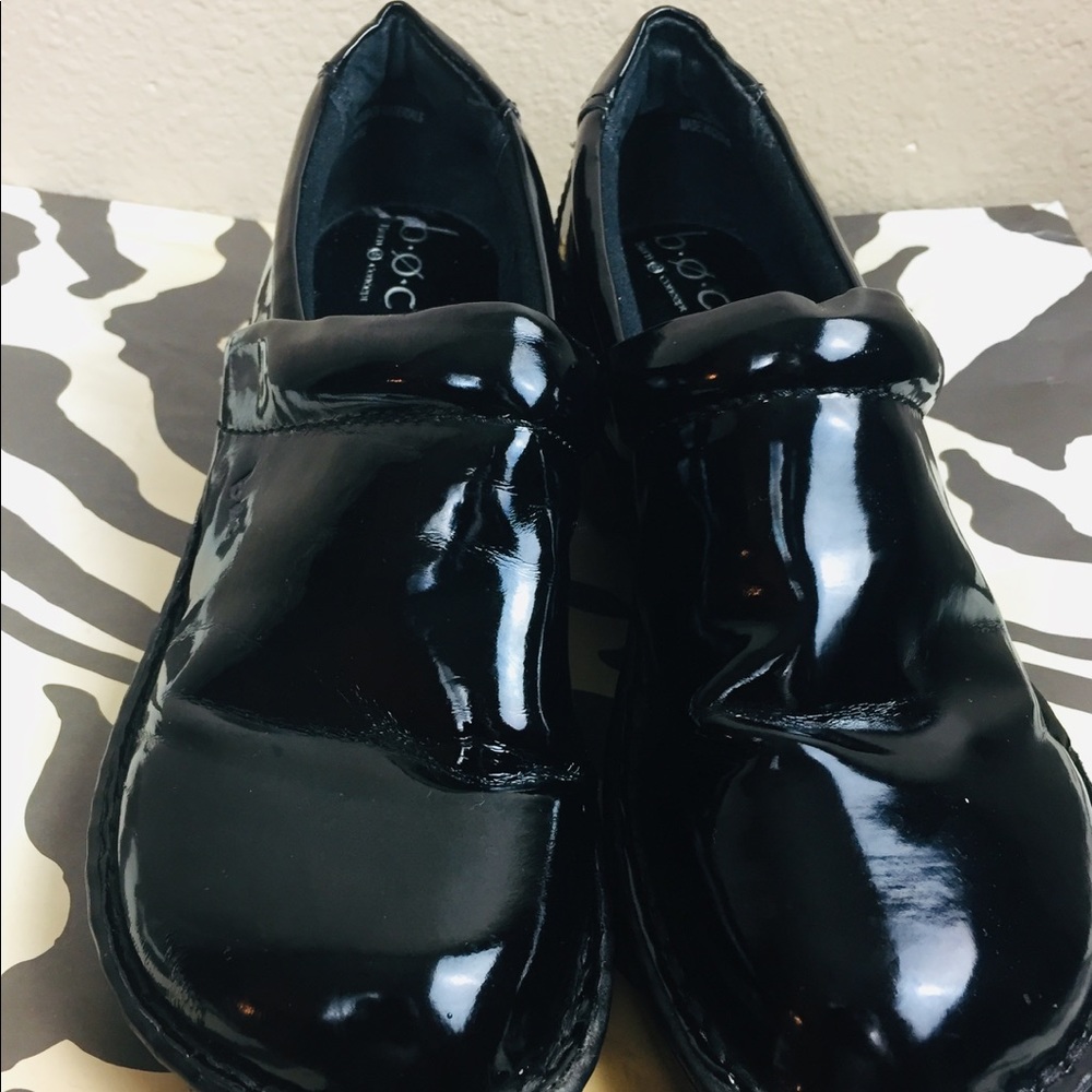 Born black patent leather clogs